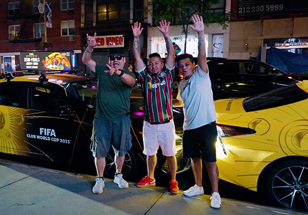 Fans celebrating near Firefly vehicles