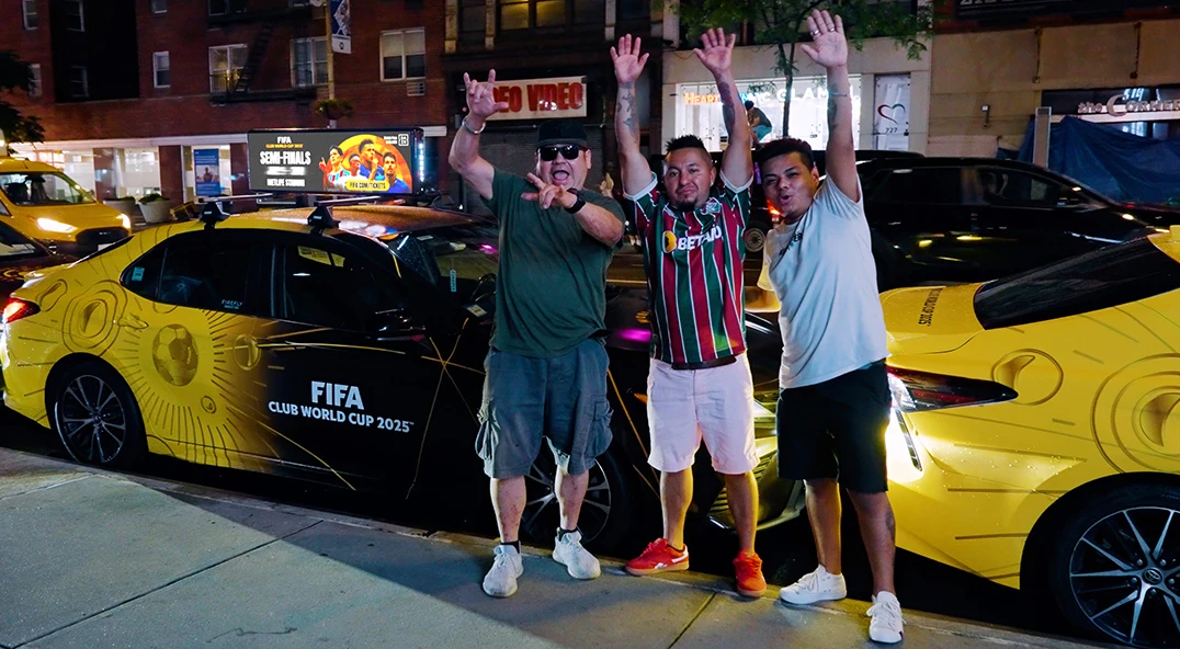 Fans celebrating near Firefly vehicles
