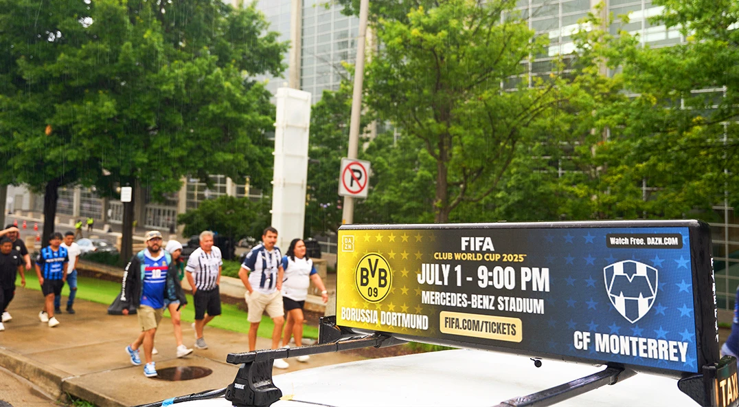 Pre-game fan gathering with Firefly vehicles