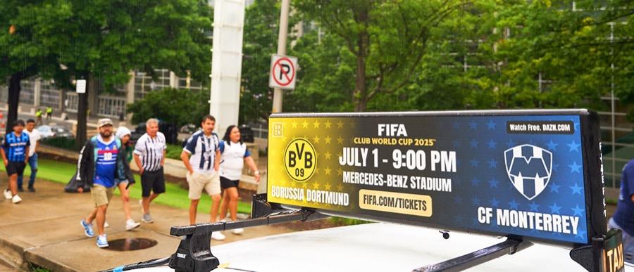 Pre-game fan gathering with Firefly vehicles